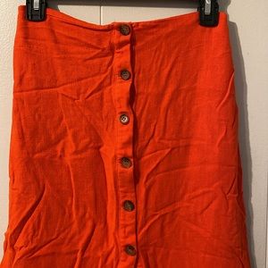 Coral red midi skirt, front slit